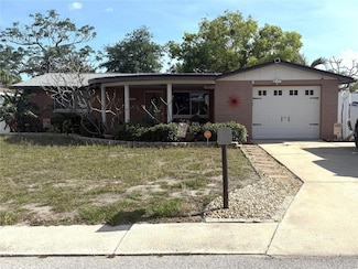 3302 Eisenhower Dr, Holiday, FL 34691