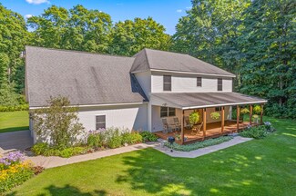 5297 Camp Ten Rd, Elmira, MI 49730