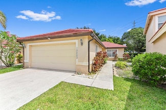 12203 Brisbane Ln, Wellington, FL 33414