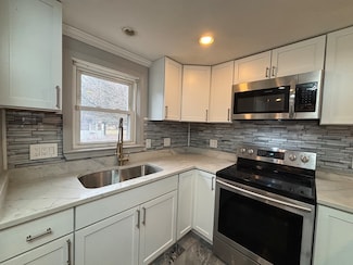 27 Evans Rd, Stoneham, MA 02180