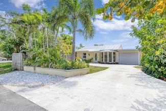 1940 Doffer Ln, North Palm Beach, FL 33408