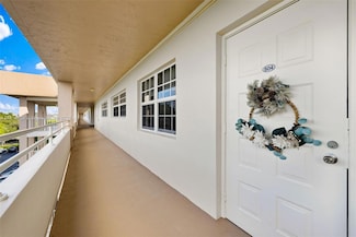 3850 Oaks Clubhouse Dr Unit 504, Pompano Beach, FL 33069