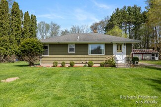 827 12 Mile Rd NW, Sparta, MI 49345