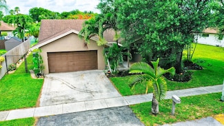 9933 NW 52nd St, Sunrise, FL 33351
