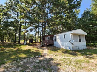 608 E Woodson Lateral Rd, Hensley, AR 72065