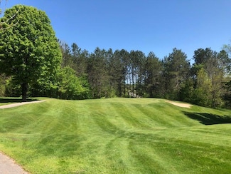 1975 + 1995 Club House Dr, Pleasantview Township, MI 49740