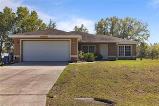 1024 Iris St E, Lehigh Acres, FL 33974