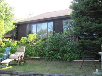 9002 Lakeshore Dr, Carp Lake, MI 49718