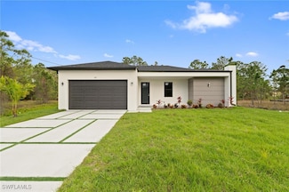 567 Flamingo Ave S, Lehigh Acres, FL 33974