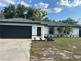 702 E 3rd St, Lehigh Acres, FL 33936