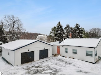 7638 Skegemog Point Rd, Williamsburg, MI 49690