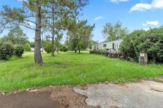 8296 Bennett Rd W, Grand Bay, AL 36541