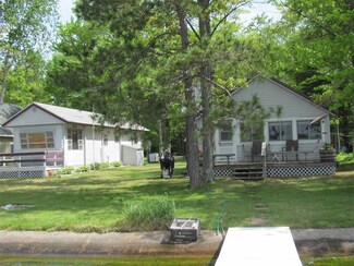 7150 Carlton Cove Unit & 7132 Carlton Cove, Carp Lake, MI 49718