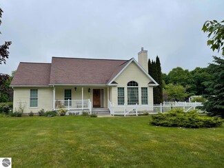 5774 Pine Aire Dr, Grawn, MI 49637