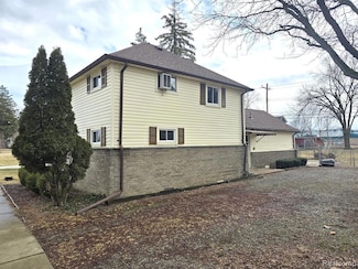 7993 Church Rd, Grosse Ile, MI 48138