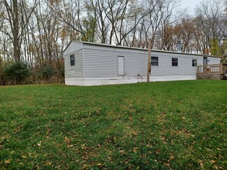1215 Peterson Rd, Osseo, MI 49266