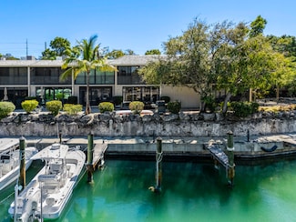 96000 Overseas Hwy Unit S3 AND 29' boat slip, Key Largo, FL 33037