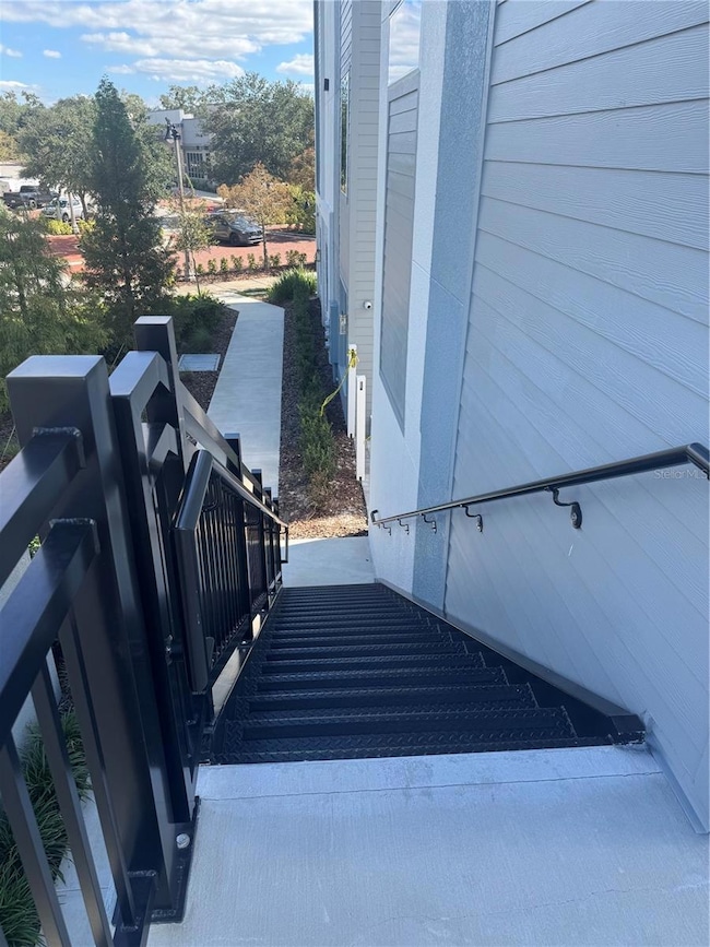 Staircase beside Unit leading to Mike Roberto Way