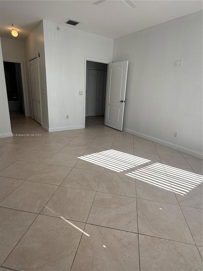 Spacious primary bedroom with 2 closets.