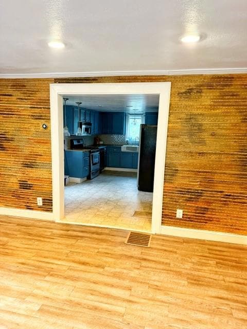 Large living area that looks into the kitchen,