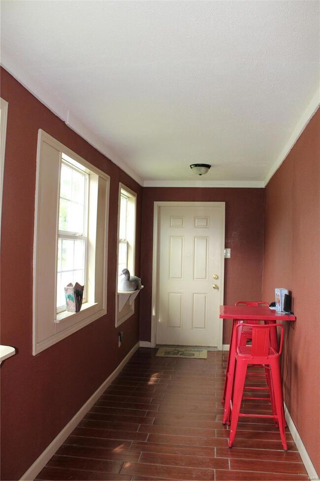 Front of house leading to garage.