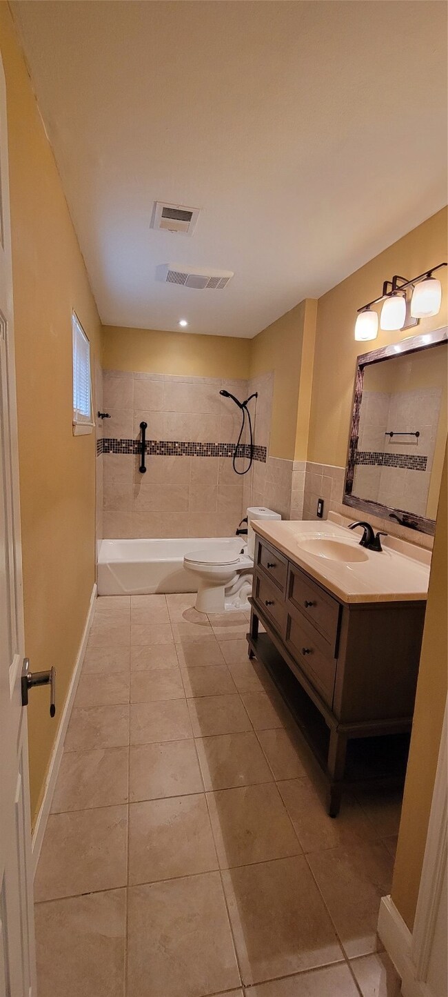 9303 Bertwood St, Houston, TX 77016 - photo 7