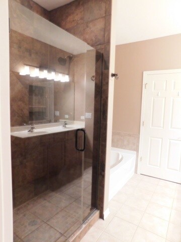 Upgraded Glass Shower Doors and a Soaker Tub in th