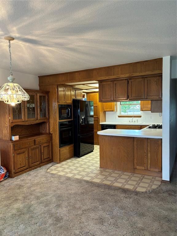 Kitchen with a built in china cabinet.