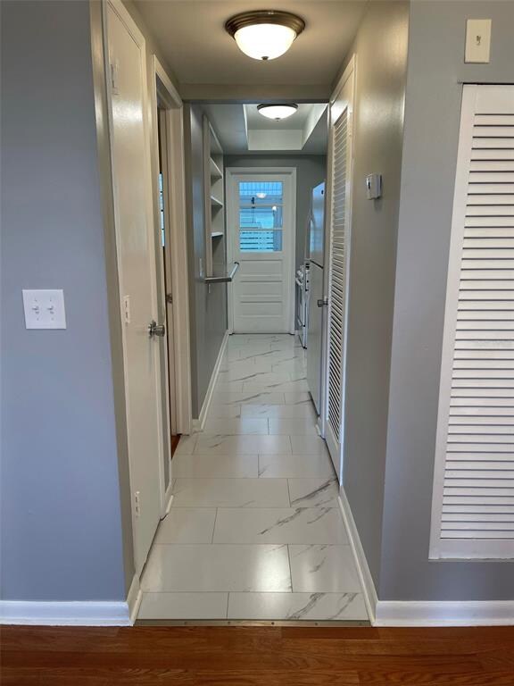 Hall to kitchen, bathroom and Florida room... beau