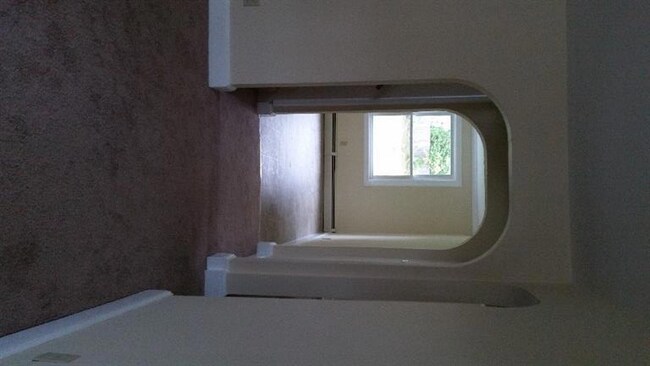 enjoy the arched doorways thru the home