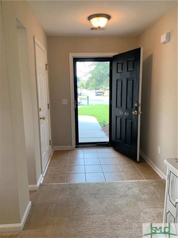 Enter the Front Door into Tiled Entry Foyer. Storm