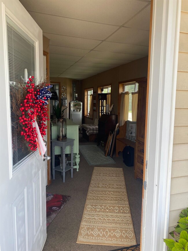 Entrance from the east side of the home to the fro