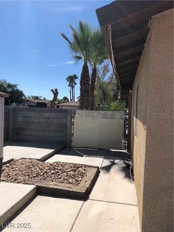 View of patio / terrace with a gate