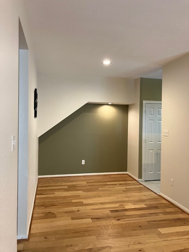 Spacious dining area with a den for cabinets