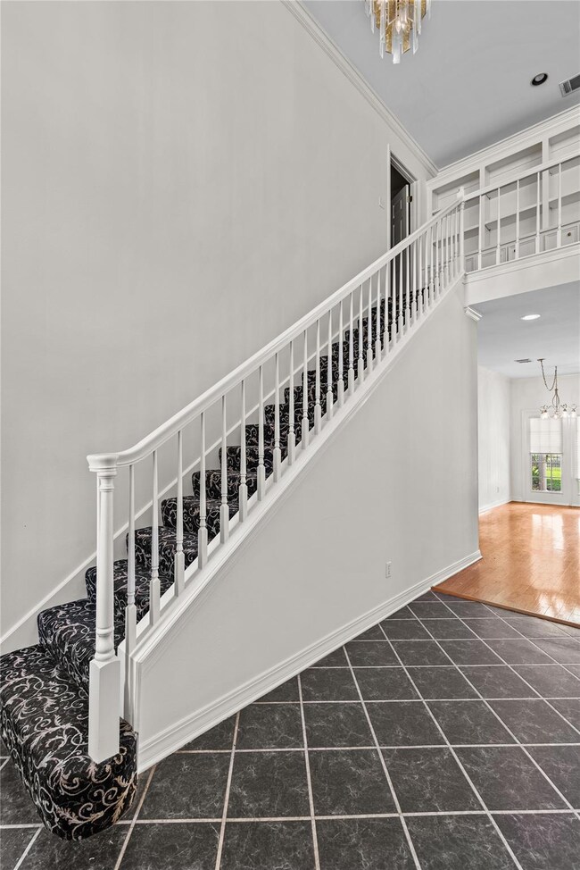Staircase with an chandelier