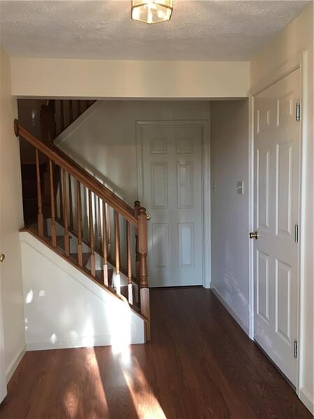 ANOTHER VIEW OF THE ENTRY . . . GARAGE ACCESS TO T