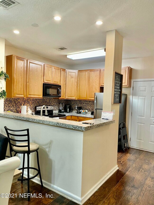 7938 Melvin Rd, Jacksonville, FL 32210 - photo 7