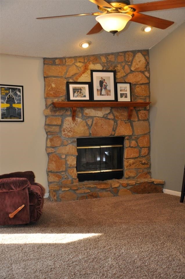 Gorgeous stone fireplace in family room.