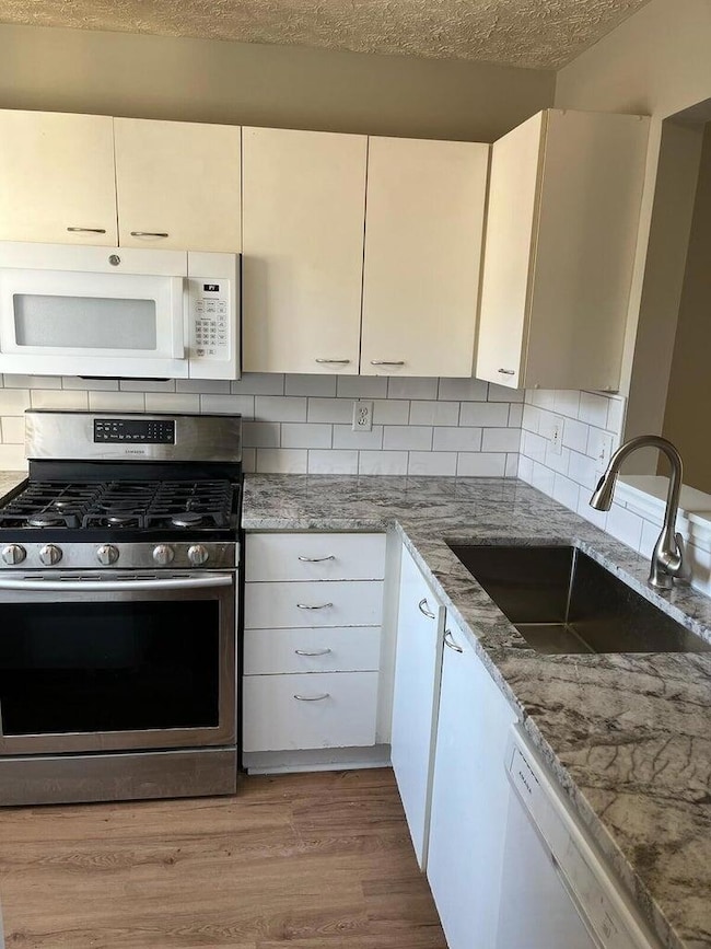 5673 Wigmore Dr unit 54E, Columbus, OH 43235 - photo 4