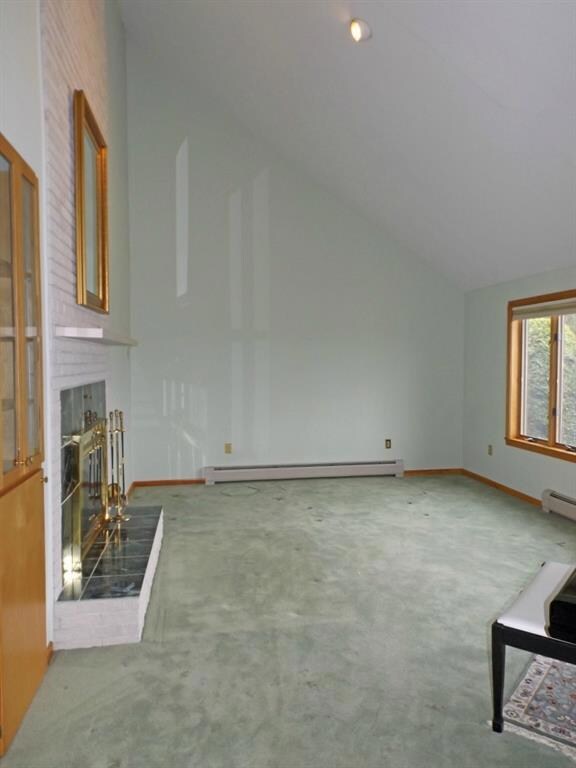 Formal living room features vaulted...
