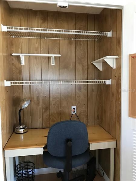 BUILT IN OFFICE NESTLED BETWEEN LIVING ROOM & DINI