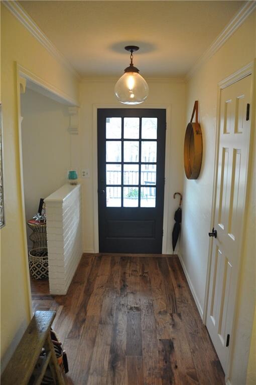 Entryway- featuring beautiful hand-scraped hickory floors that run throughout home.