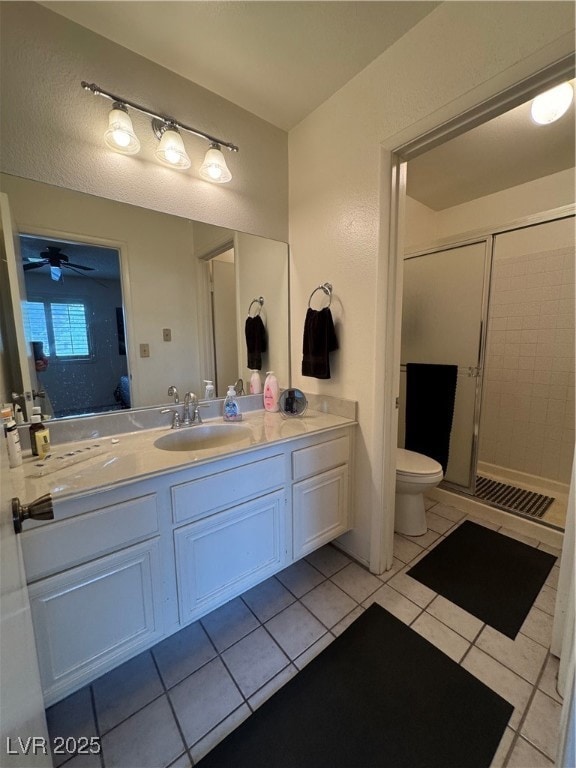 Full bathroom with vanity, toilet, a shower stall,