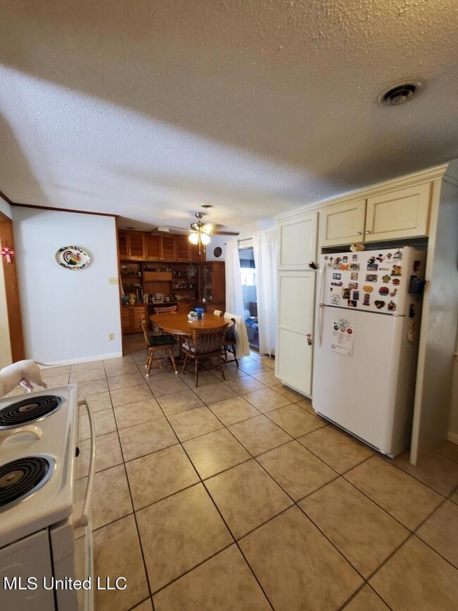 Kitchen with builtins on West end