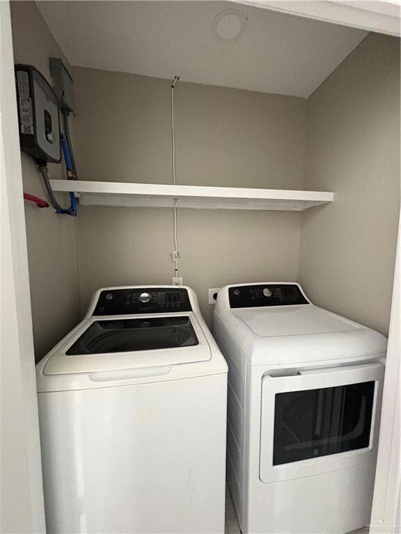 Laundry room featuring washer and dryer