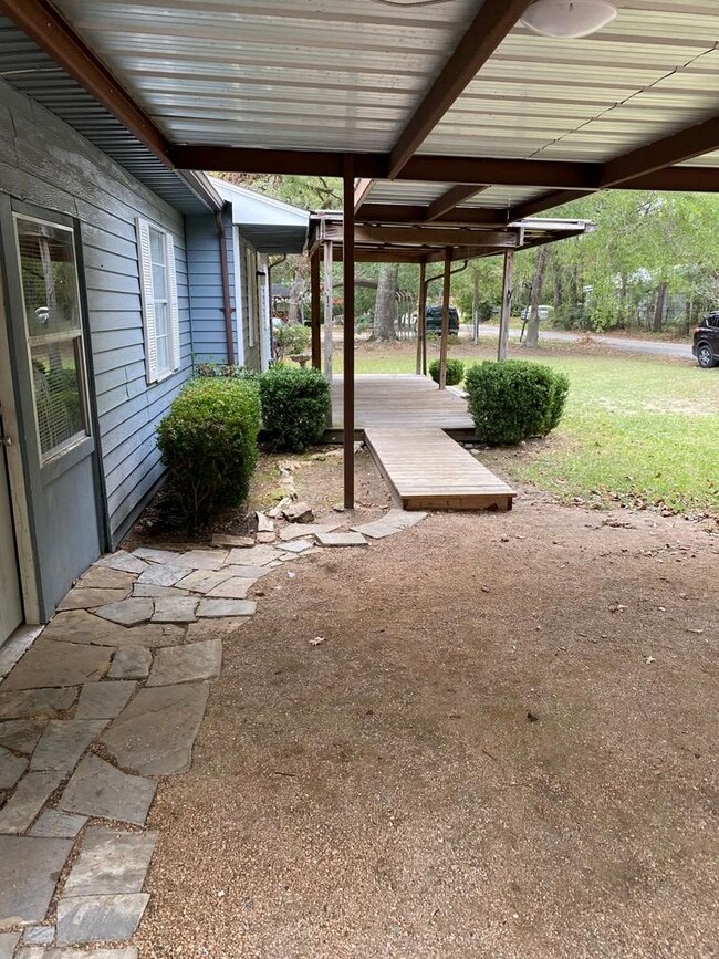Covered walkway from carport to front door