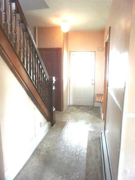Entry/Foyer. Grand Entry with Original Woodwork on