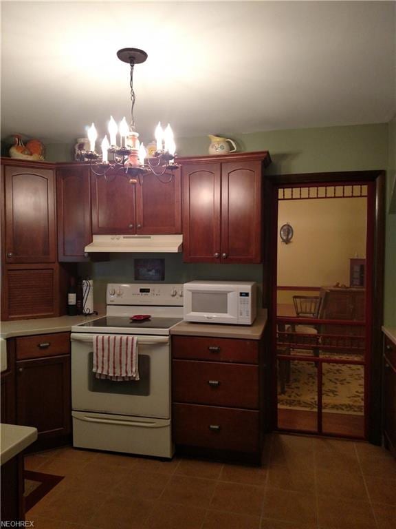 This pretty kitchen leads to a formal dining room.