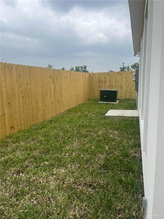 View of fenced backyard