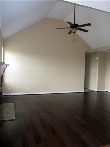 Great Room  w/ Hardwood Floors, Fireplace & Vaulted Ceilings